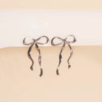 Jumbo Bow Stud Earrings by Oh Clementine