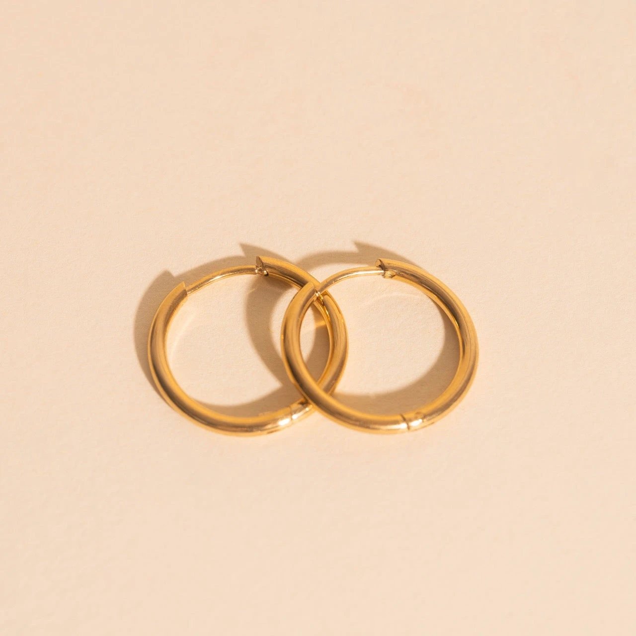 Circle Rounded Huggie Hoop Earrings by Oh Clementine