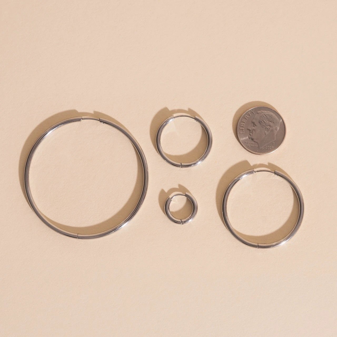 Circle Rounded Huggie Hoop Earrings by Oh Clementine