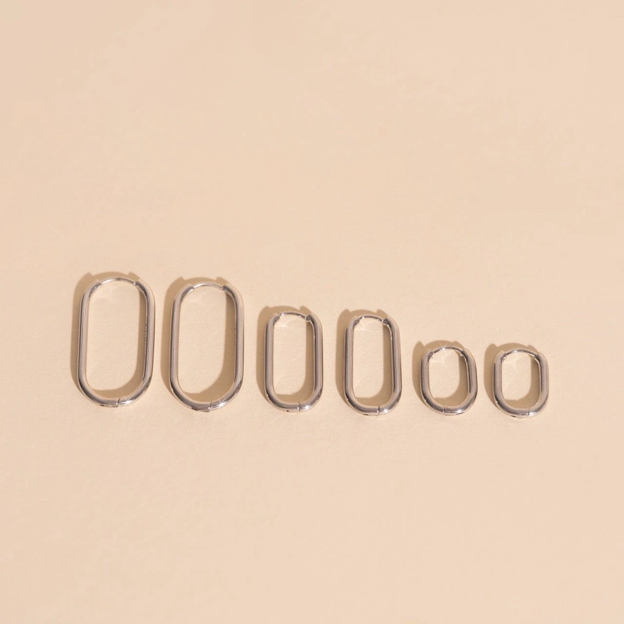 Rectangle Rounded Huggie Hoop Earrings by Oh Clementine
