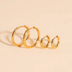 Circle Rounded Huggie Hoop Earrings by Oh Clementine