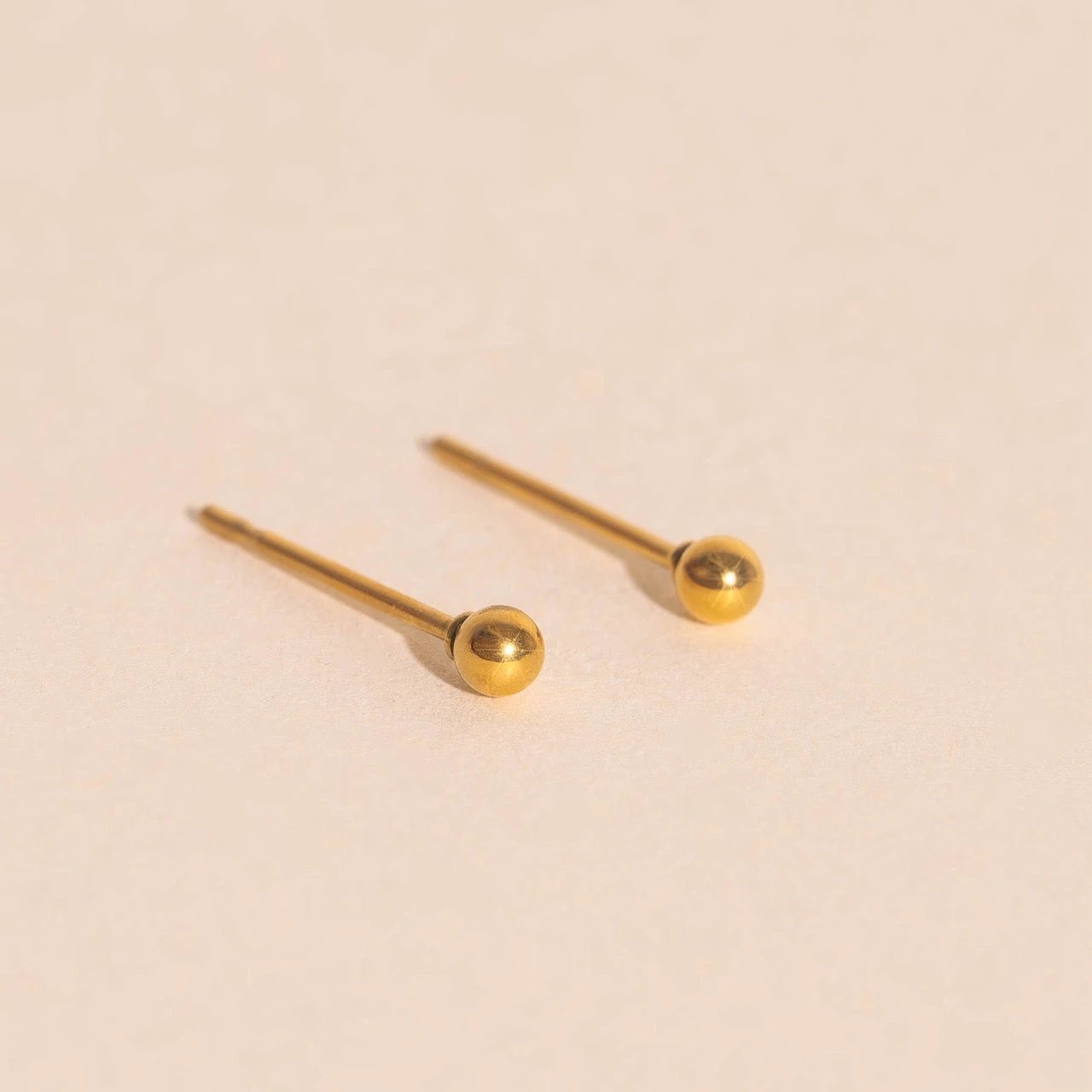 Tiny Ball Stud Earrings by Oh Clementine