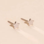 Mini Star Stud Earrings by Oh Clementine