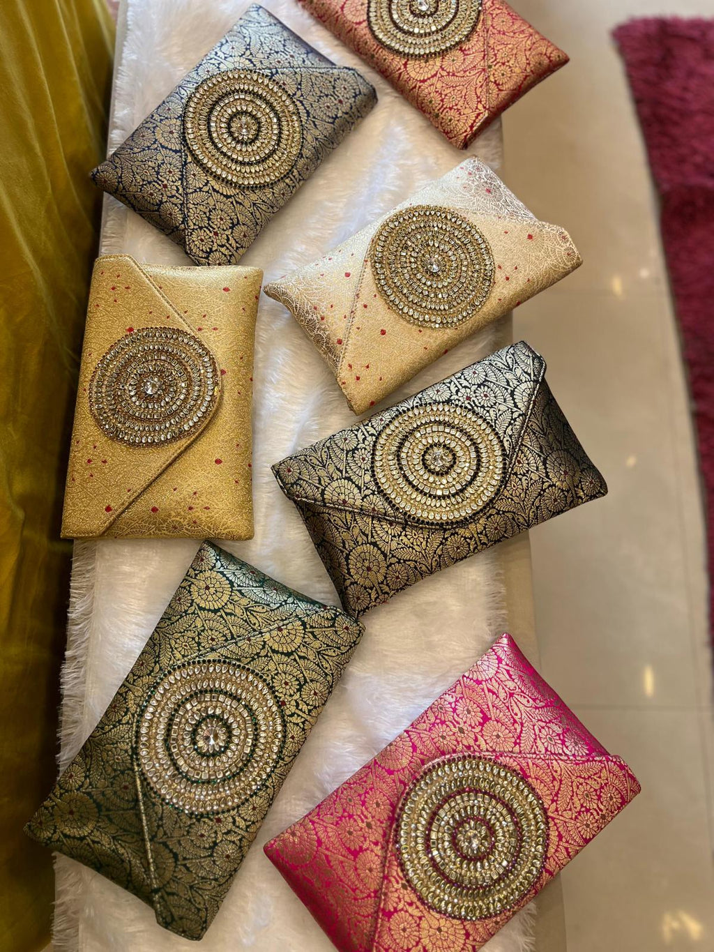 Rich Brocade Zari Clutch with Circular Motif With Stone