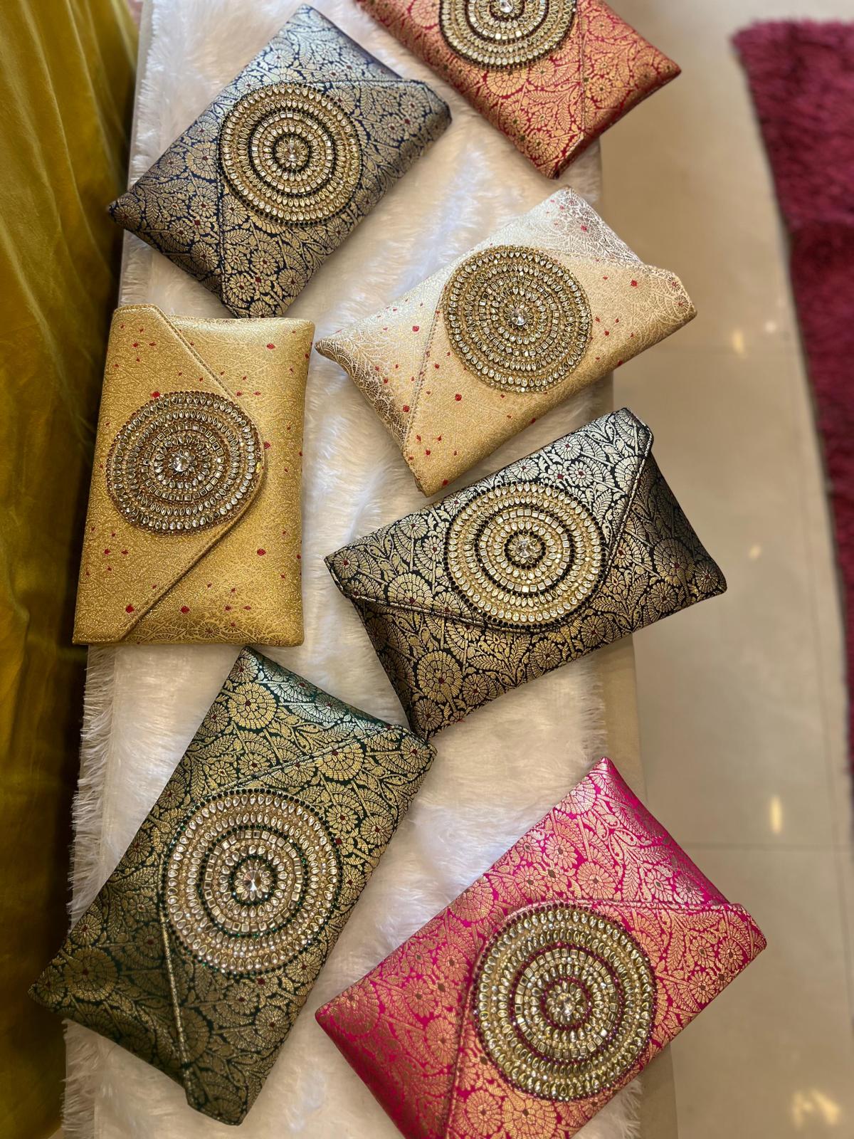 Rich Brocade Zari Clutch with Circular Motif With Stone