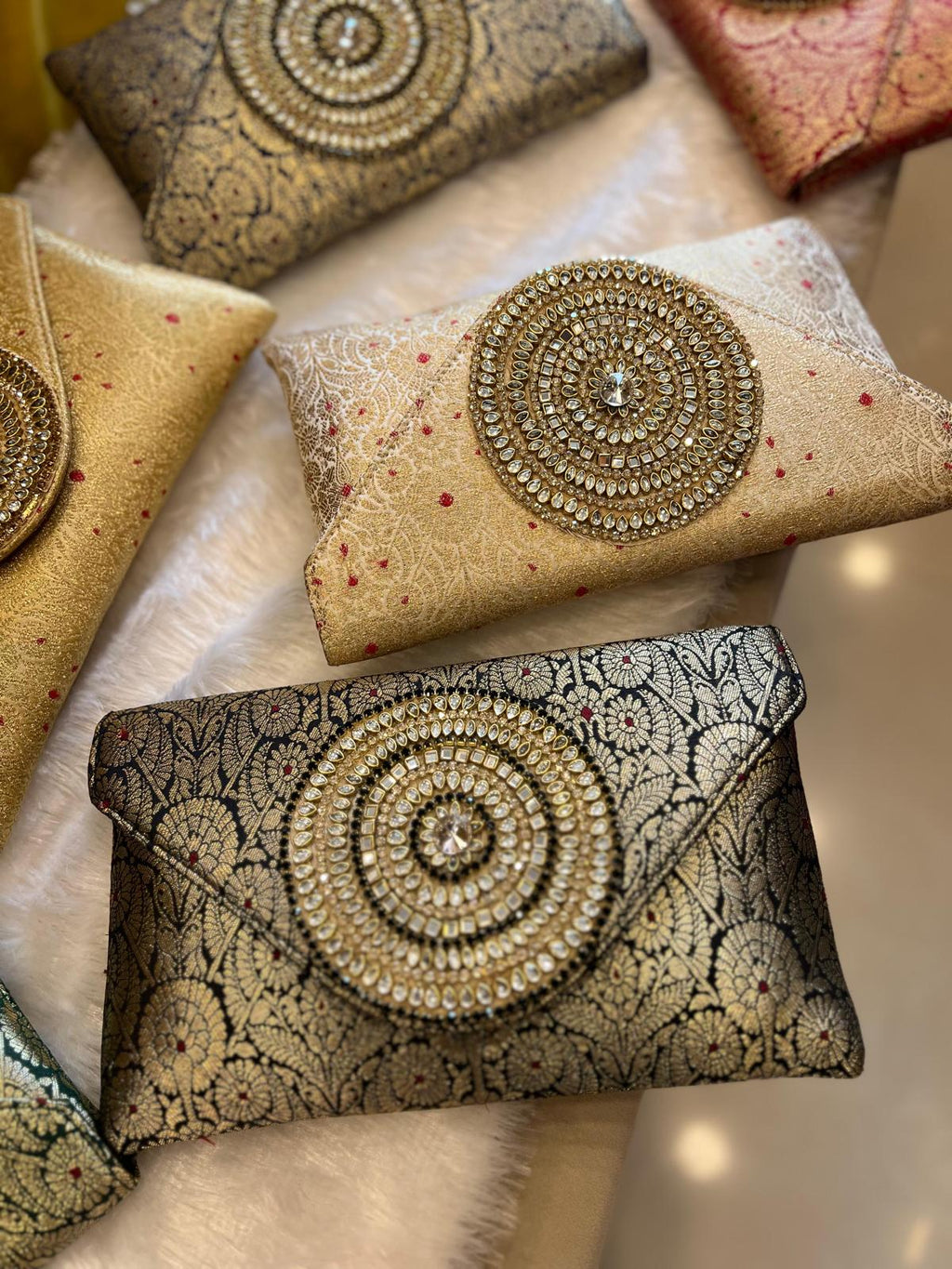 Rich Brocade Zari Clutch with Circular Motif With Stone
