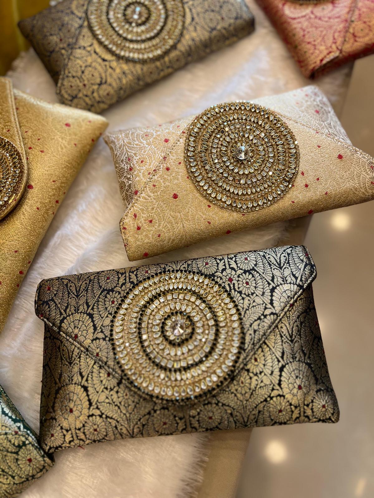 Rich Brocade Zari Clutch with Circular Motif With Stone