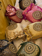 Rich Brocade Zari Potli Bag with Circular Motif With Stone