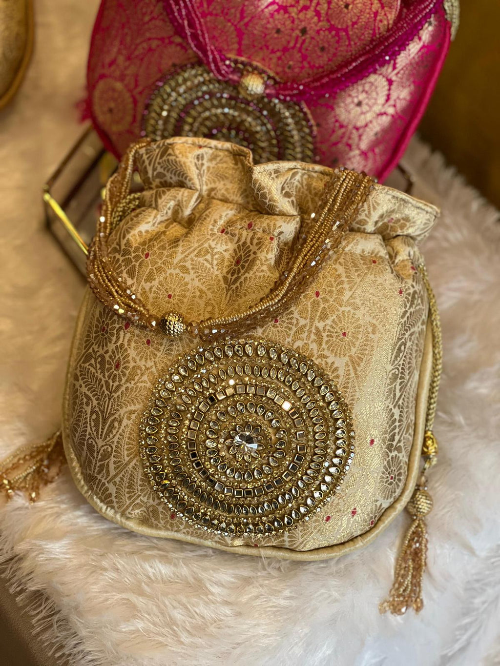 Rich Brocade Zari Potli Bag with Circular Motif With Stone