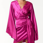 Satin Bell Long Sleeve Wrap Mini Dress in Magenta [Available in Sizes SM-L] by The Bullish Store