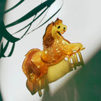 Velvet Claws Golden Horse Hair Claw by The Bullish Store