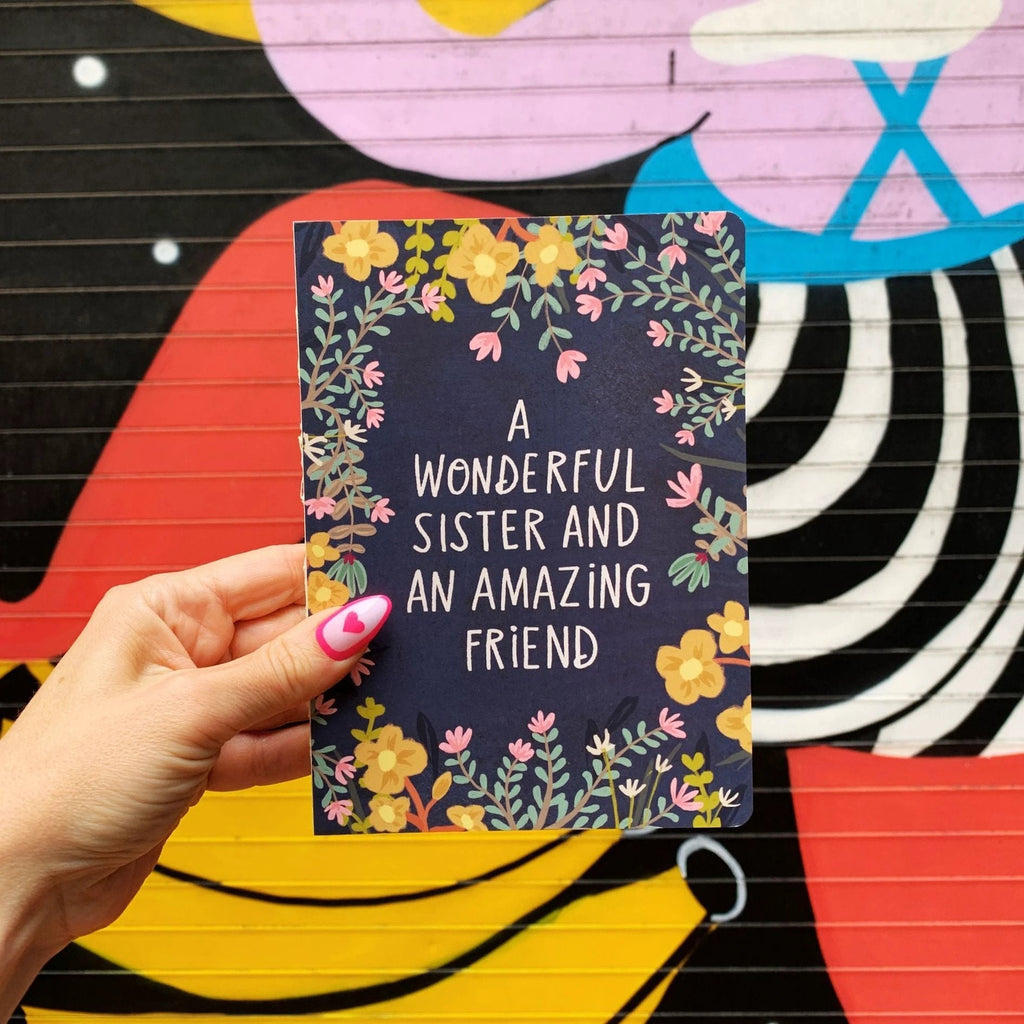 A Wonderful Sister and An Amazing Friend Double-Sided Journal by The Bullish Store