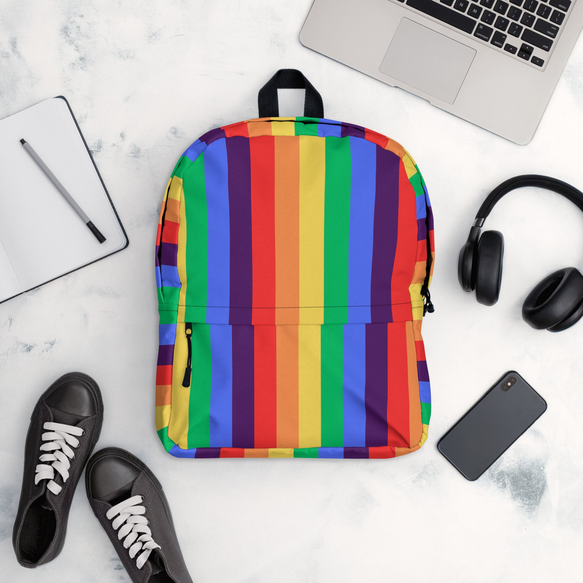 A polyester Rainbow striped Backpack with a front pocket