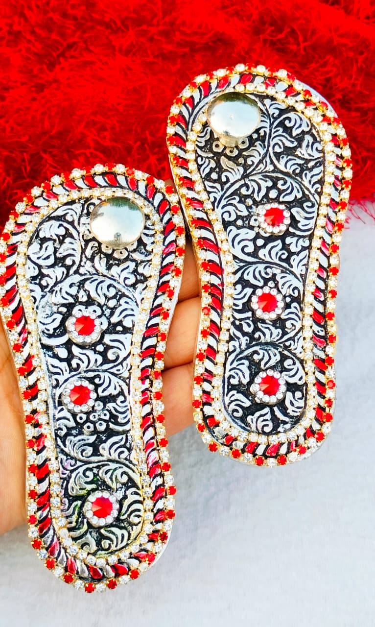 Antique Finish German Silver Laxmi Charan Paduka with Stone Work in Matching Potli La Vie Bien Antique Finish German Silver Laxmi Charan Paduka with Stone Work in Matching Potli