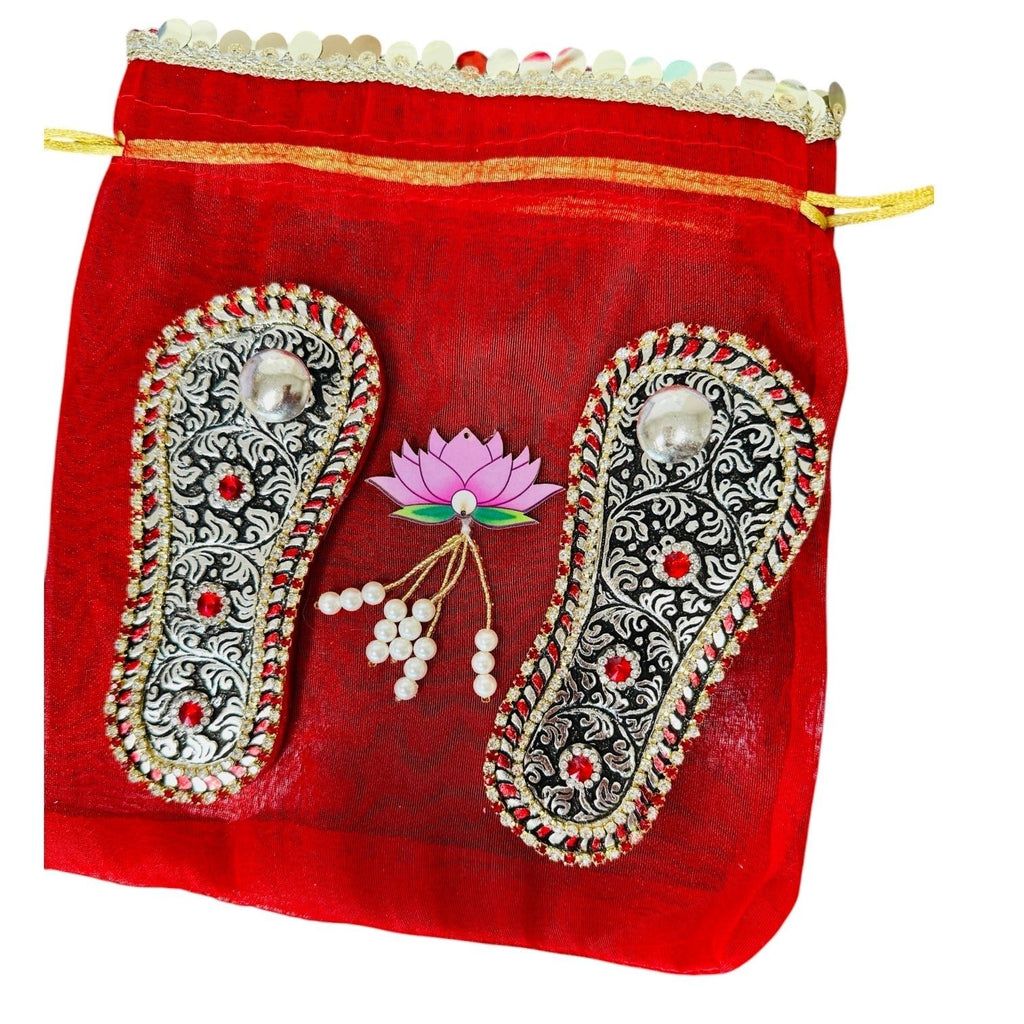 Antique Finish German Silver Laxmi Charan Paduka with Stone Work in Matching Potli La Vie Bien Antique Finish German Silver Laxmi Charan Paduka with Stone Work in Matching Potli