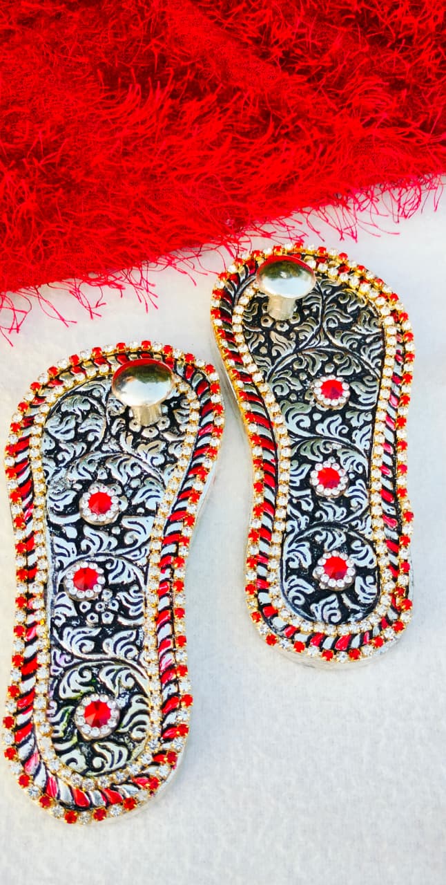 Antique Finish German Silver Laxmi Charan Paduka with Stone Work in Matching Potli La Vie Bien Antique Finish German Silver Laxmi Charan Paduka with Stone Work in Matching Potli