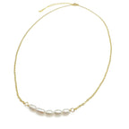 Aurora gold and pearl necklace by Alegria Accessories Inc