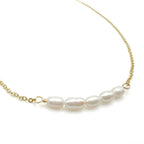 Aurora gold and pearl necklace by Alegria Accessories Inc