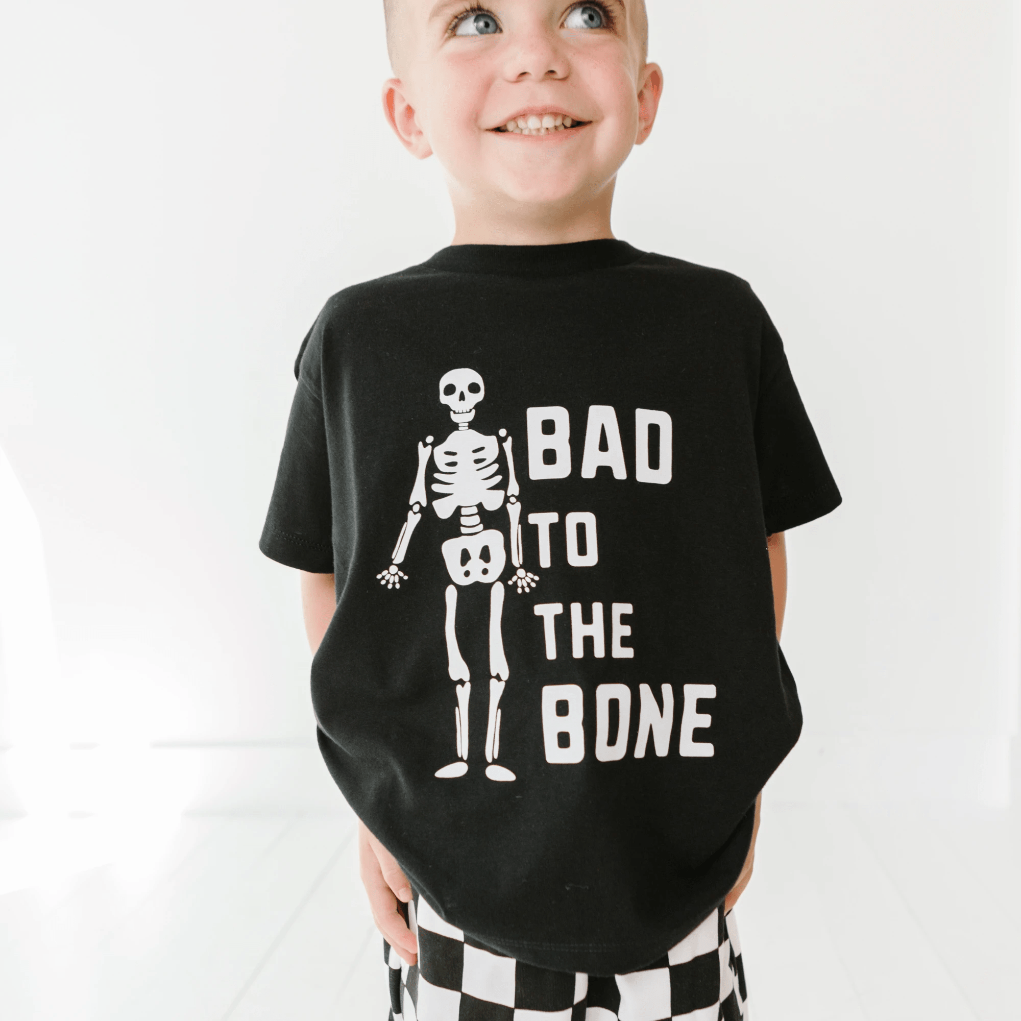Bad to the Bone toddler and youth tee, Halloween collection by Benny and Ray Apparel