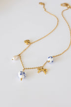 Bella Charm Necklace in Blue by Rose & Clay