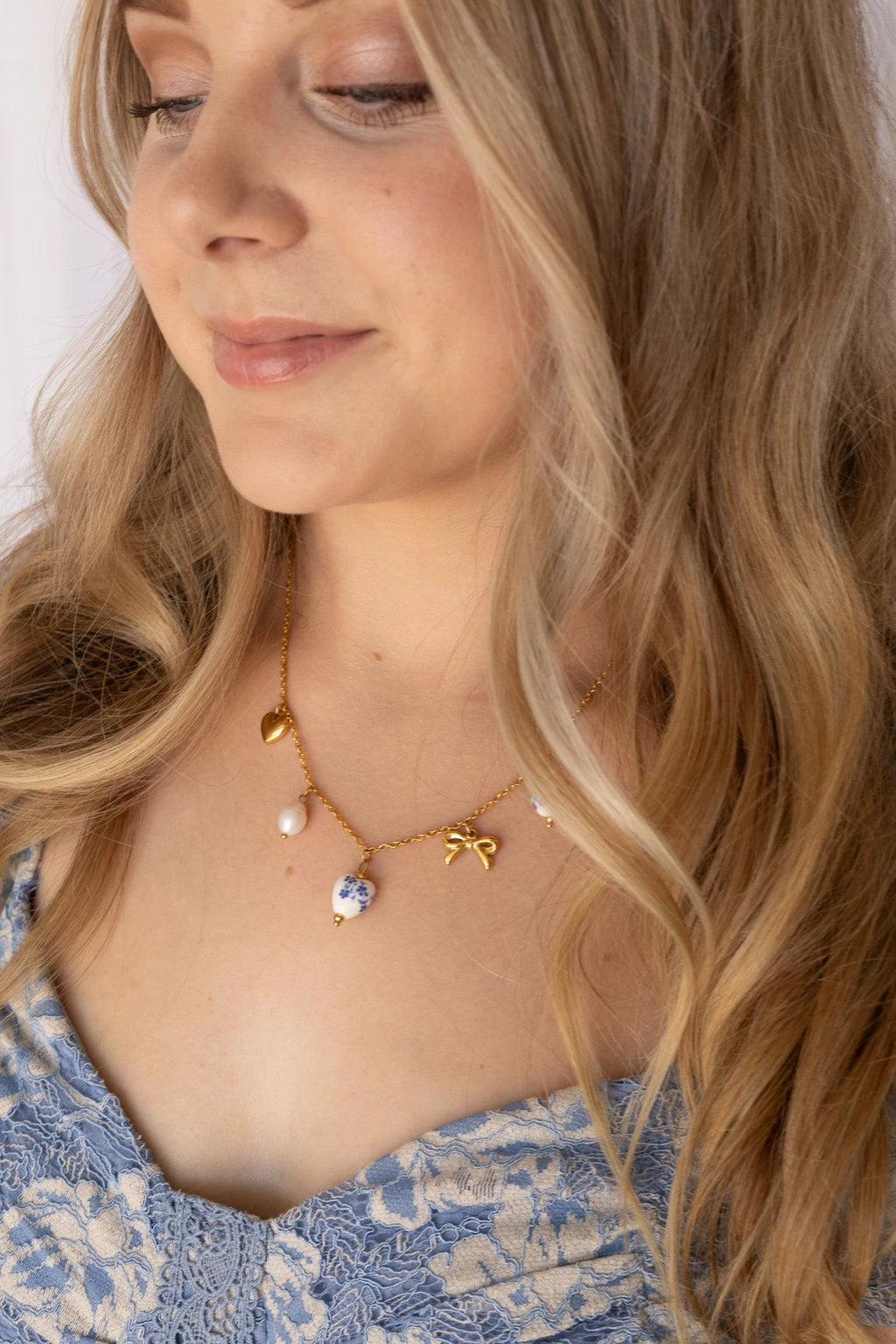 Bella Charm Necklace in Blue by Rose & Clay