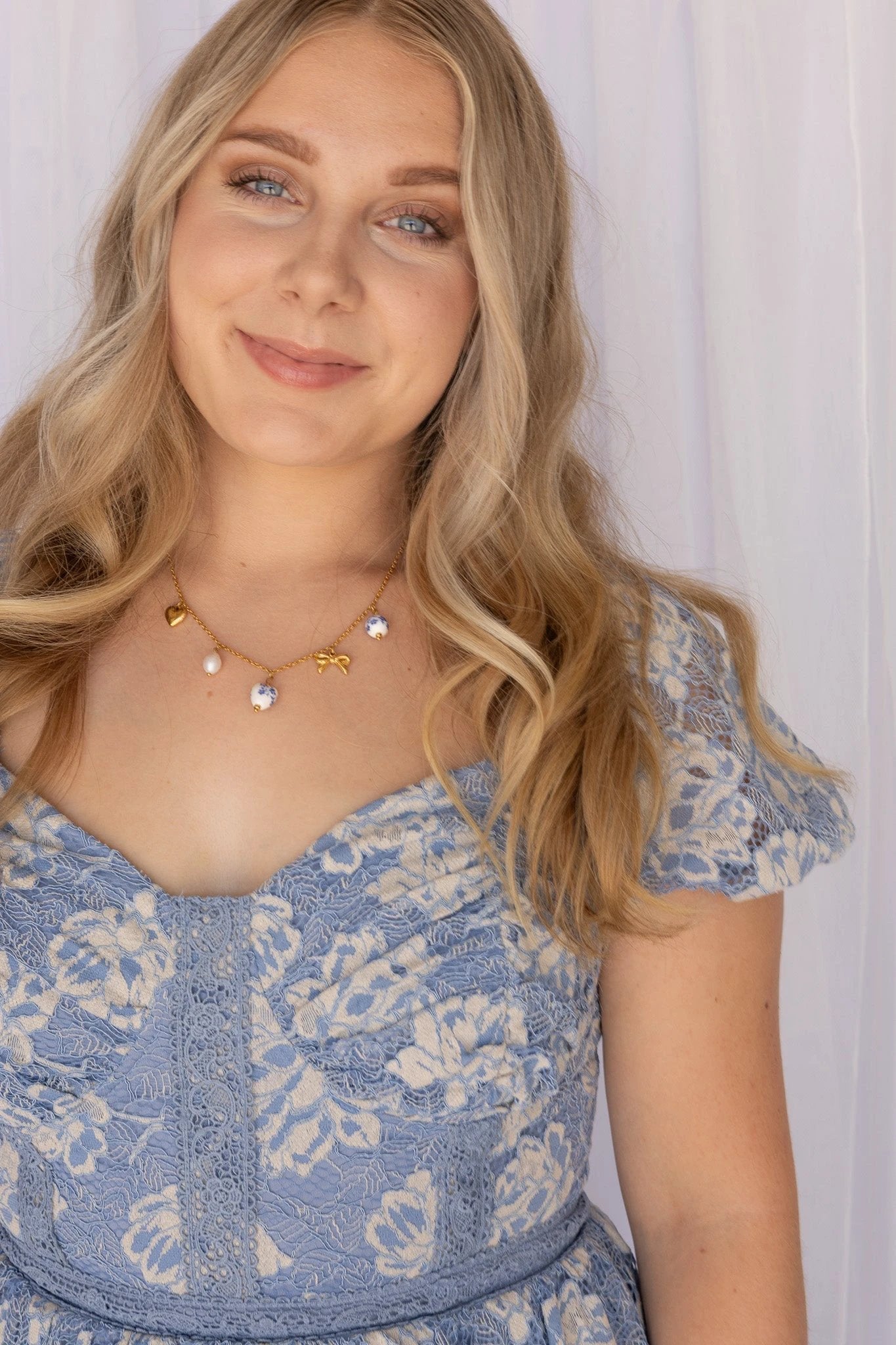 Bella Charm Necklace in Blue by Rose & Clay