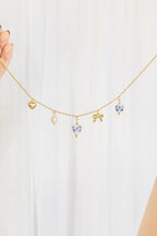 Bella Charm Necklace in Blue by Rose & Clay