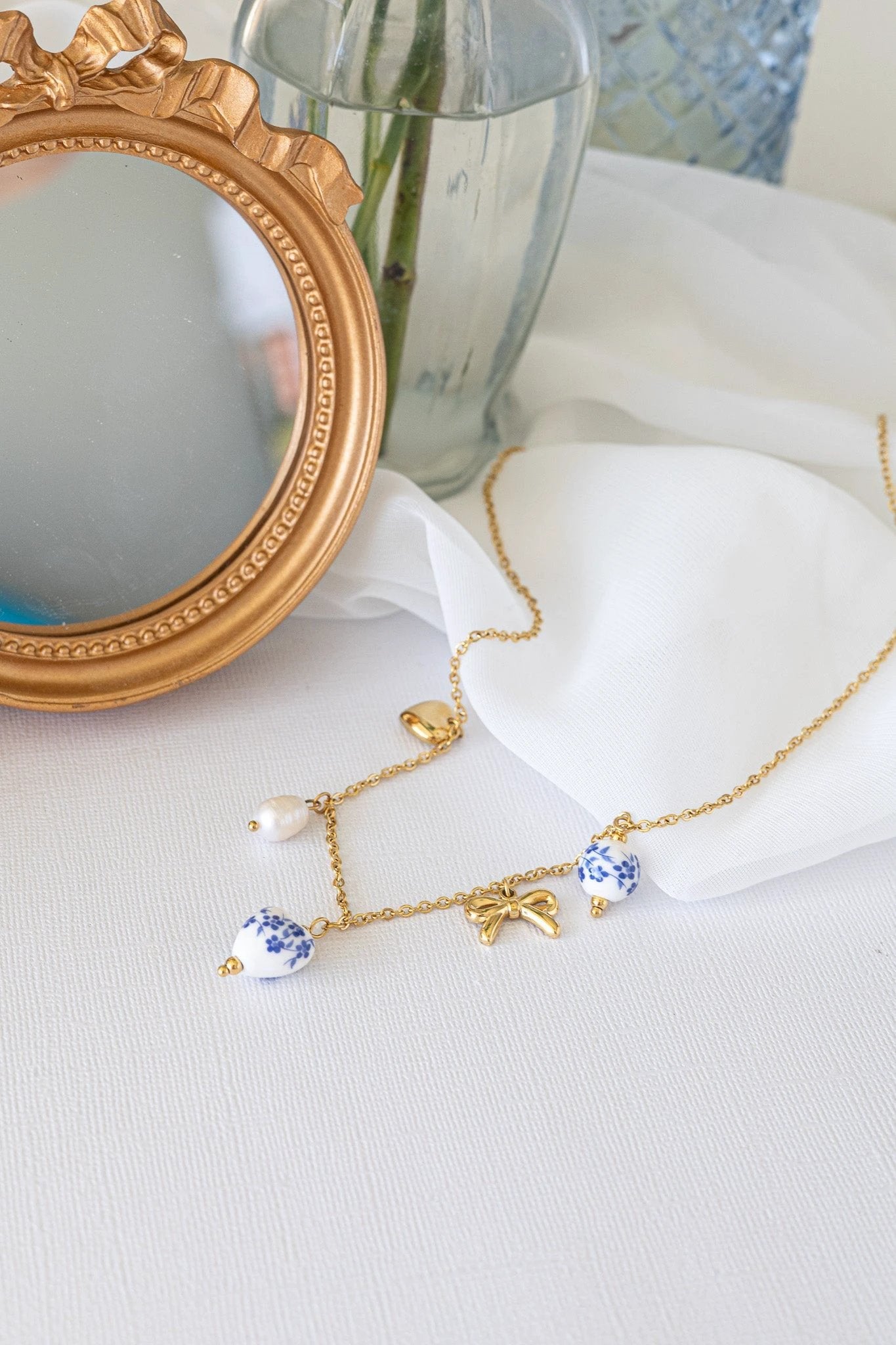 Bella Charm Necklace in Blue by Rose & Clay