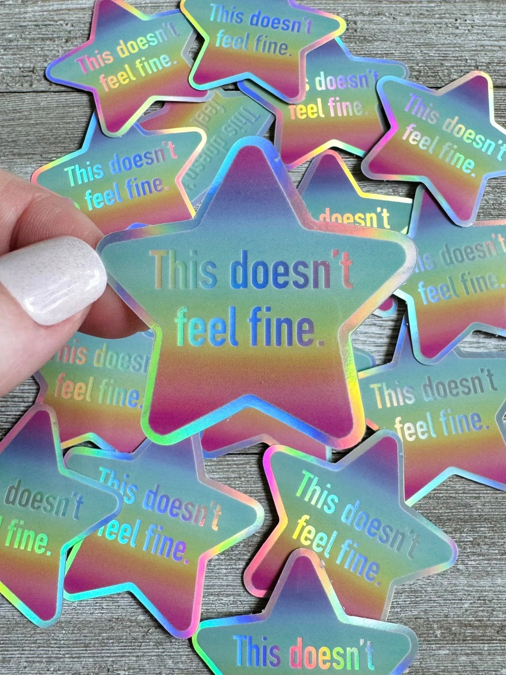 Bespattered Facade Holographic Rainbow This Doesn't Feel Fine Sticker by Bespattered Facade