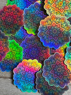 Bespattered Facade Pastel Rainbow Flower Mandala Holographic Sticker by Bespattered Facade