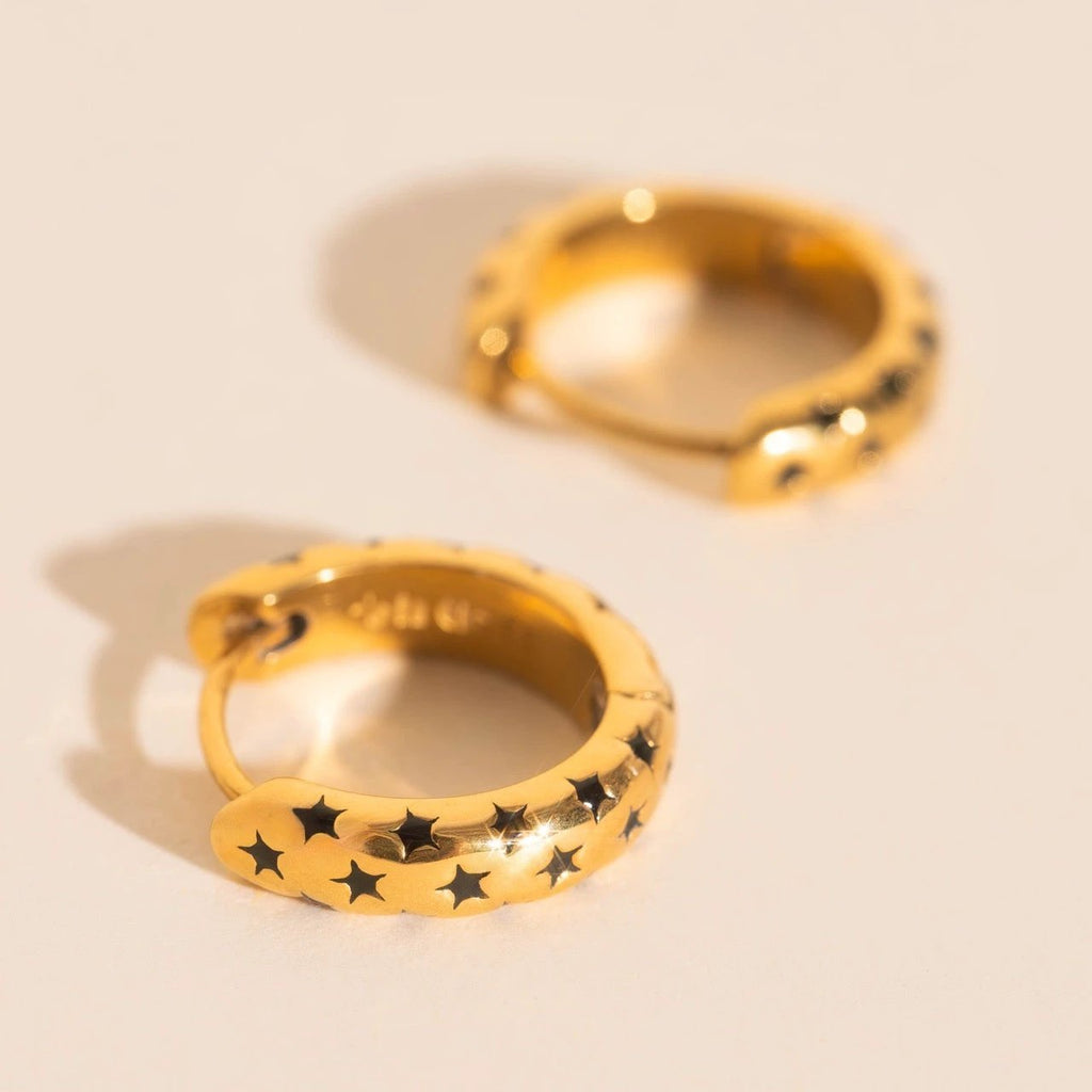 Black Star Chunky Huggie Hoop Earrings by Oh Clementine