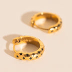 Black Star Chunky Huggie Hoop Earrings by Oh Clementine