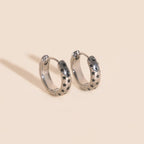 Black Star Chunky Huggie Hoop Earrings by Oh Clementine
