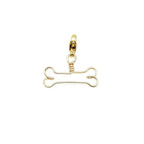 Bone gold charm by Alegria Accessories Inc