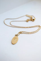 Bow Pendant Necklace by Rose & Clay