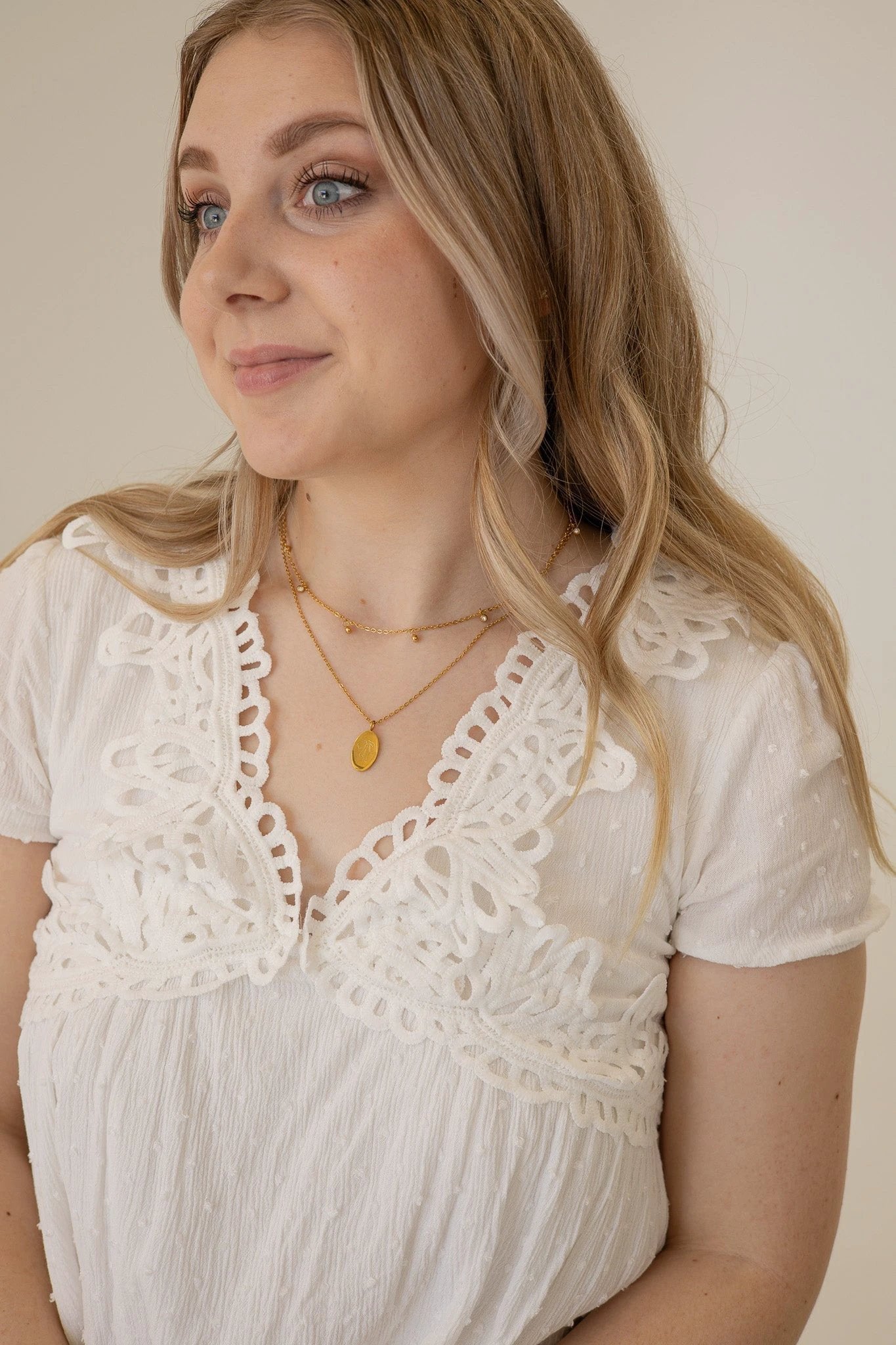 Bow Pendant Necklace by Rose & Clay