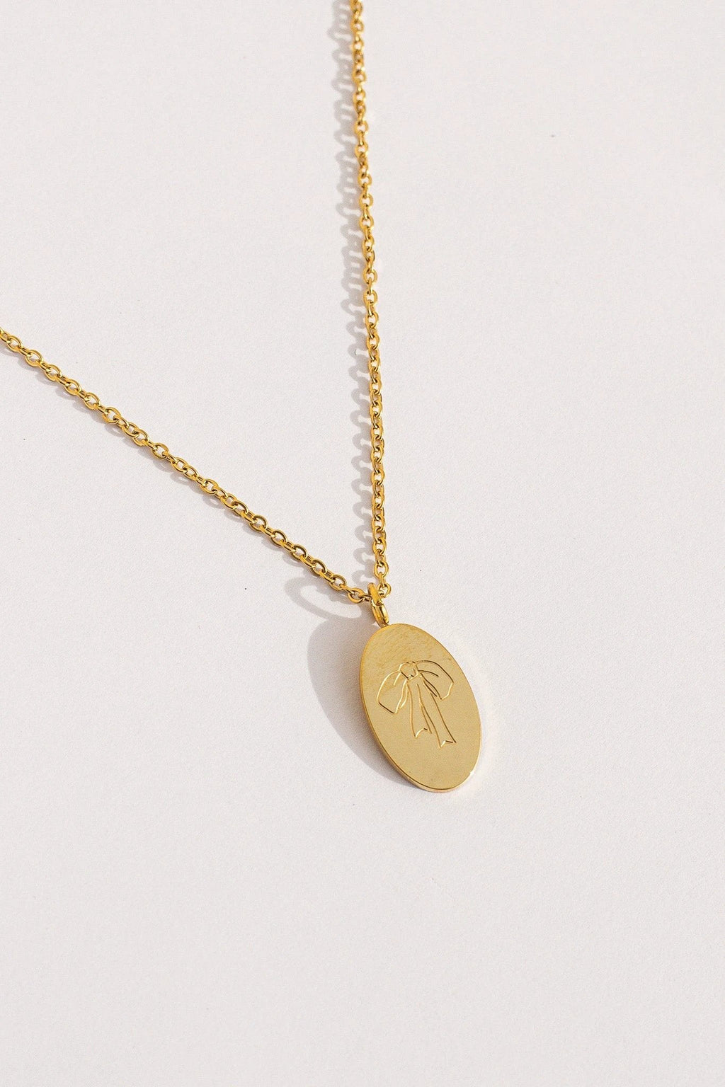 Bow Pendant Necklace by Rose & Clay