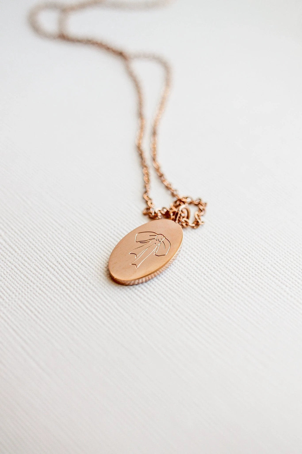 Bow Pendant Necklace by Rose & Clay