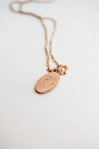 Bow Pendant Necklace by Rose & Clay