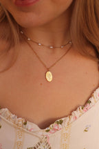 Bow Pendant Necklace by Rose & Clay