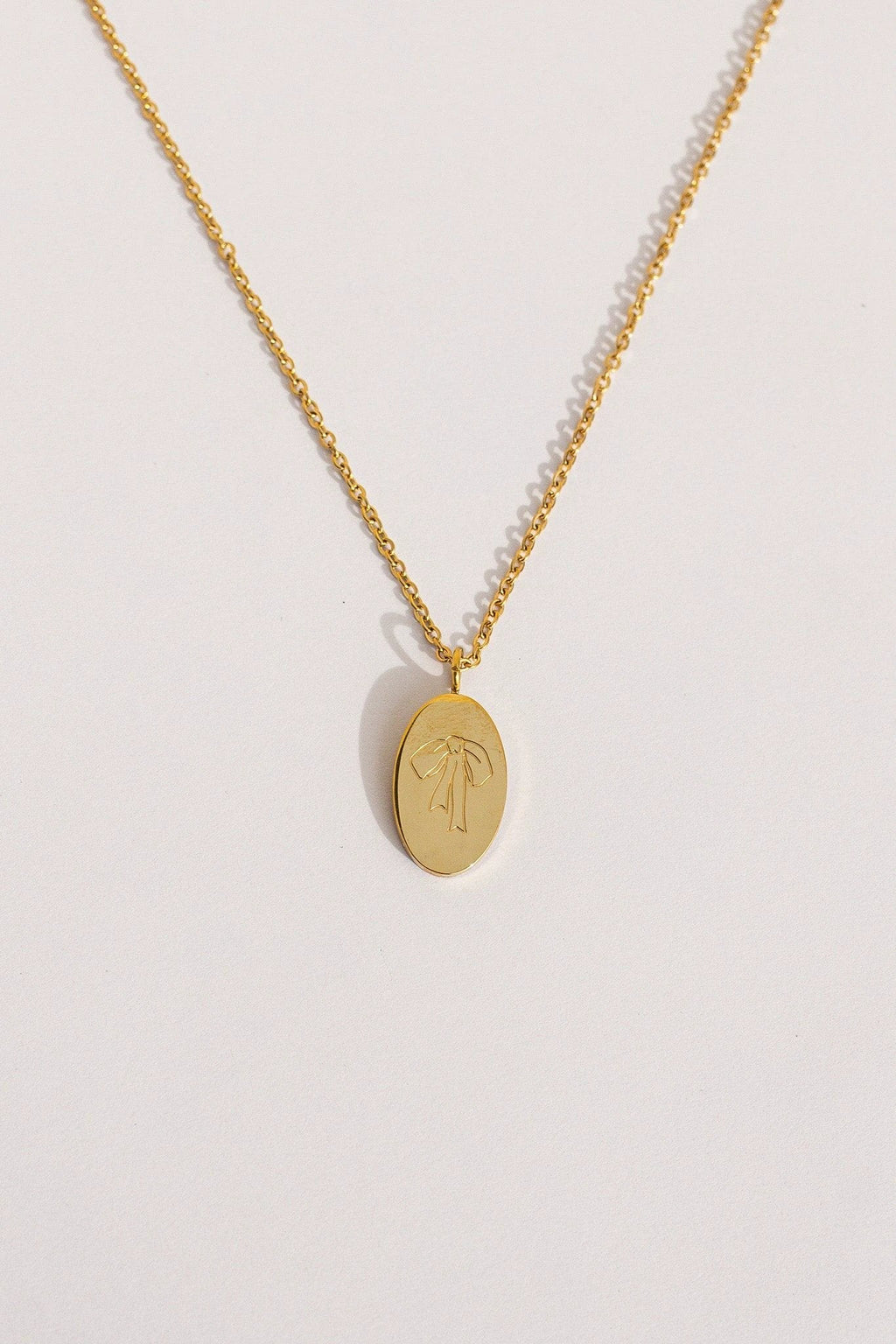 Bow Pendant Necklace by Rose & Clay