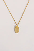 Bow Pendant Necklace by Rose & Clay