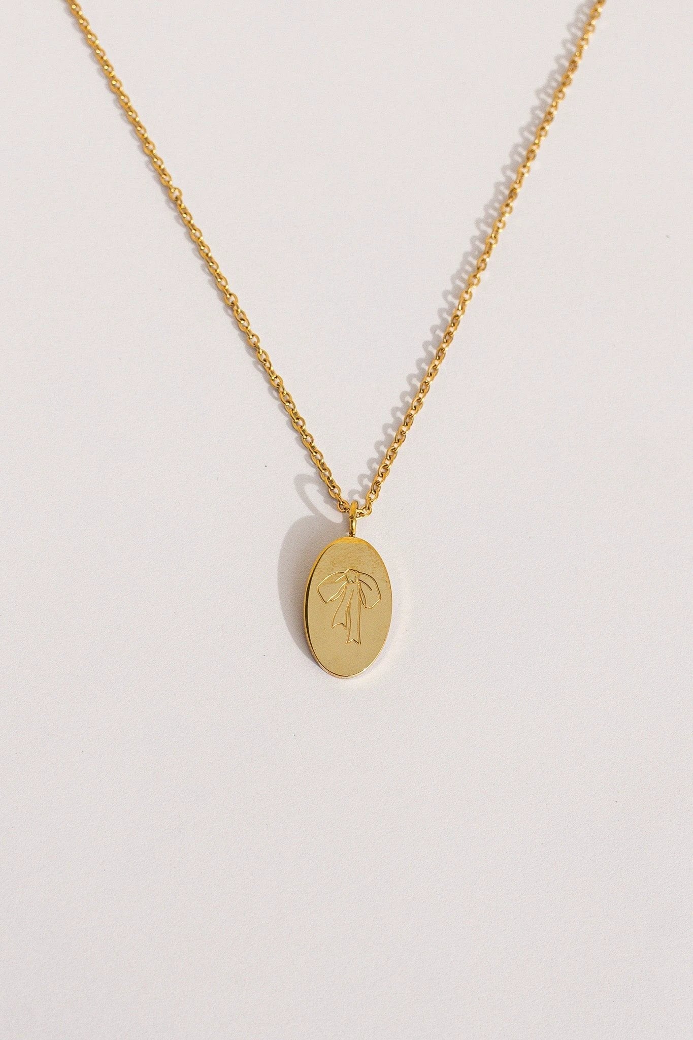 Bow Pendant Necklace by Rose & Clay