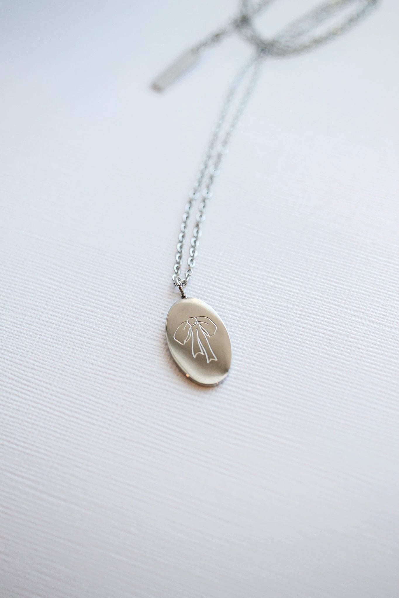 Bow Pendant Necklace by Rose & Clay