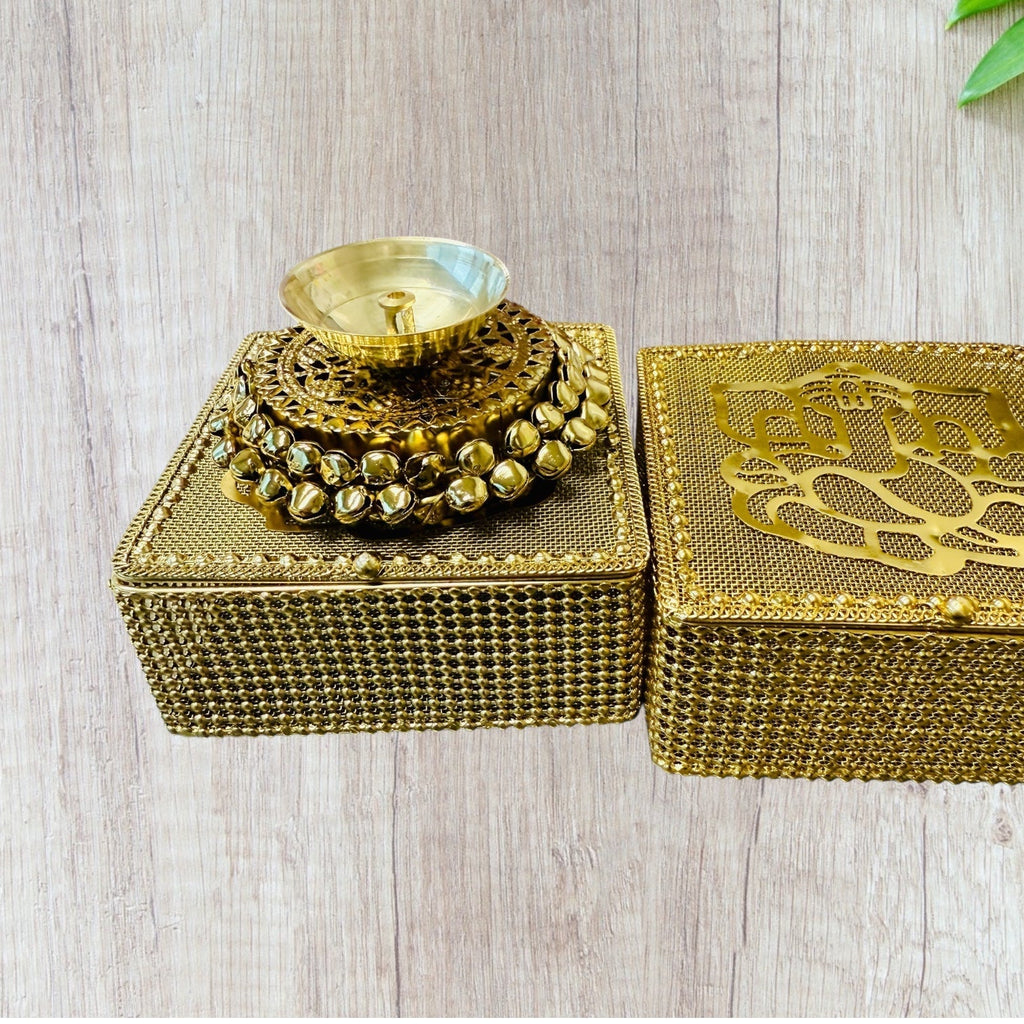 Brass Akhand Diya's with Ghungroo Base in Metal Gift Box with Ganesha Decal La Vie Bien Brass Akhand Diya's with Ghungroo Base in Metal Gift Box with Ganesha Decal