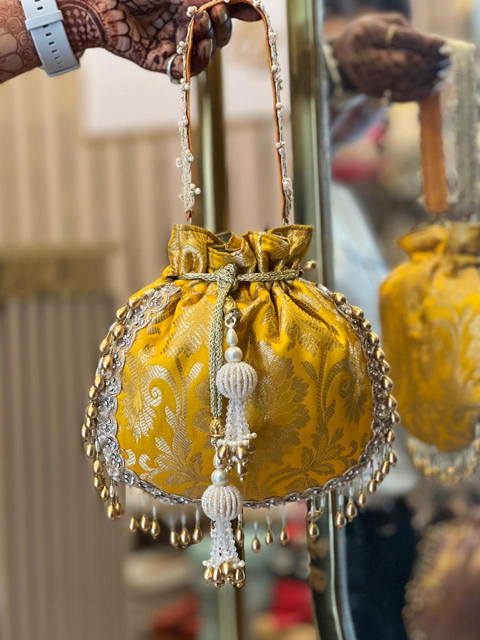 Brocade Potli Bag with Pearl Tassels & Designer Closing Thread La Vie Bien Brocade Potli Bag with Pearl Tassels & Designer Closing Thread
