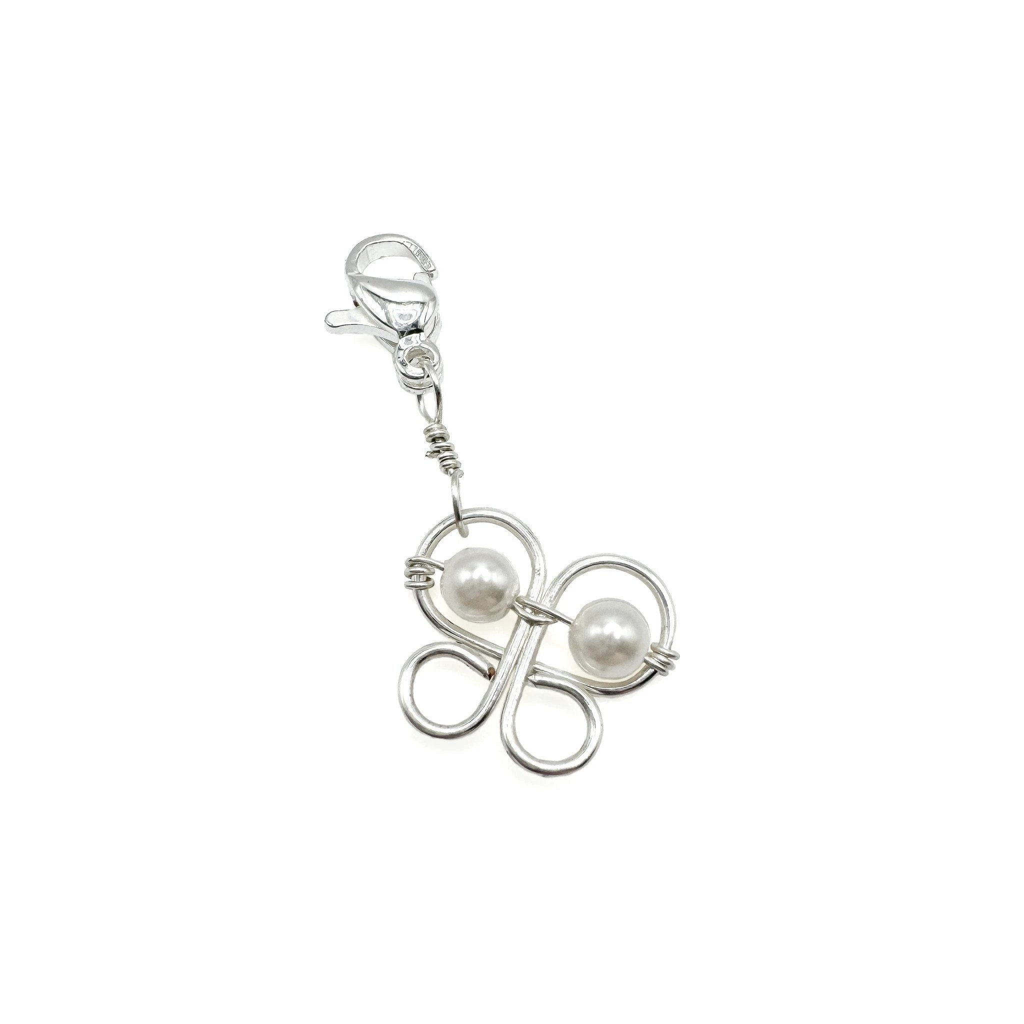 Butterfly silver charm by Alegria Accessories Inc