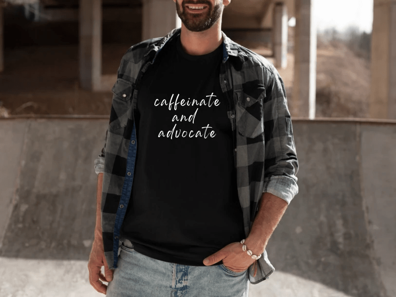 Caffinate and Advocate T-Shirt (Black) by RainBee Designs LLC