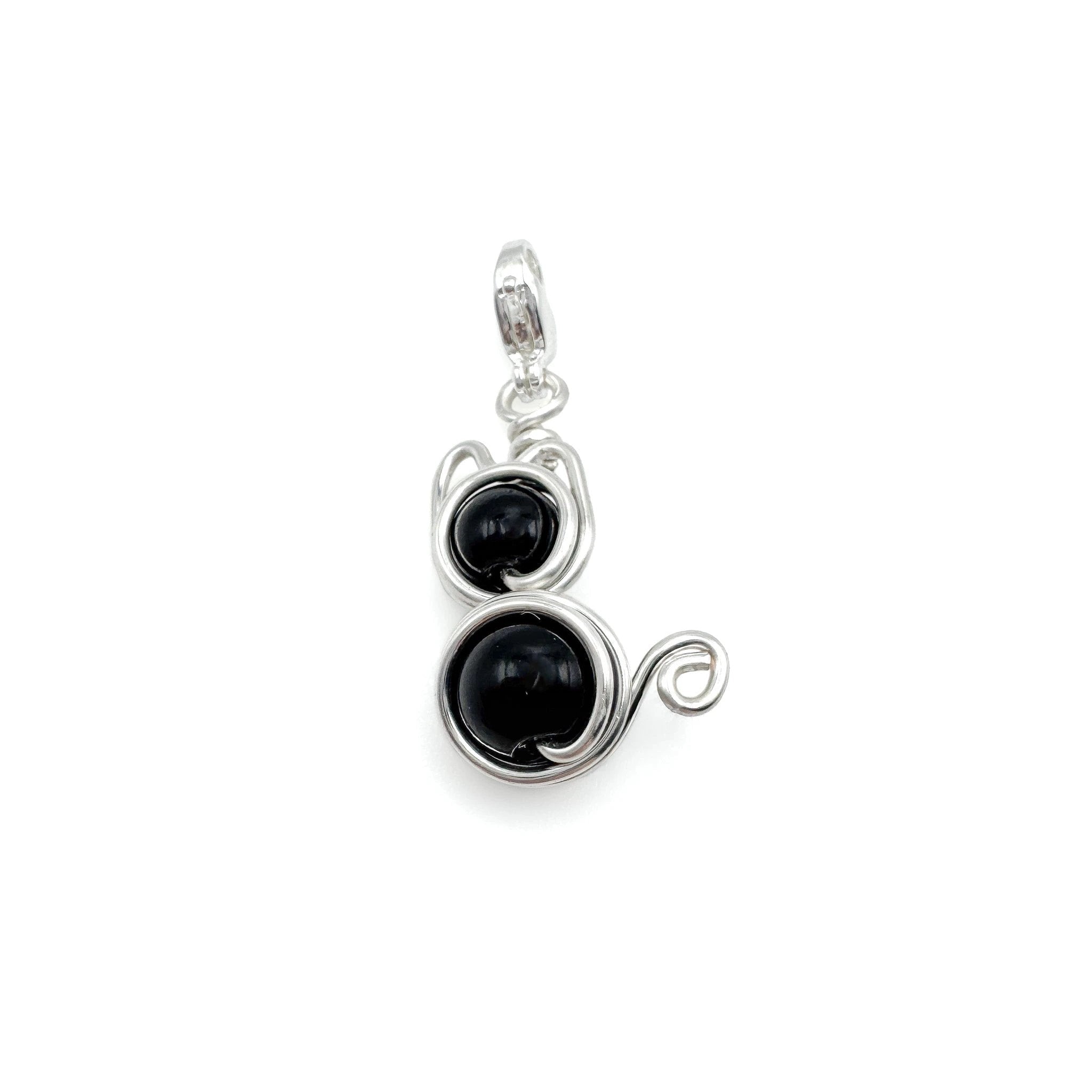 Cat silver charm by Alegria Accessories Inc