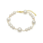 Celestial pearl and gold adjustable link bracelet by Alegria Accessories Inc
